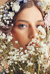 Image showing Woman, beauty and flower portrait for natural skincare, cosmetics makeup and floral head crown. Spring flowers, organic body care and skin wellness with facial headshor or dermatology glow in studio