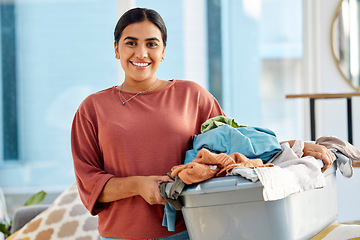 Image showing Cleaning, cleaner and woman with laundry, clothes washing and cleaner service, housekeeping and hygiene. Wash fabric, clean and spring cleaning, housework portrait and housekeeper with laundry basket