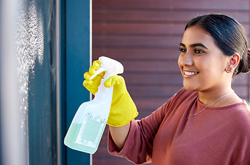 Image showing Woman, hands or spray bottle in window cleaning in hotel, home or office building in hygiene maintenance or bacteria housekeeping safety. Cleaner, happy maid or spring cleaning glass doors or product