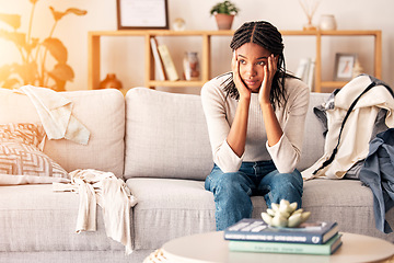 Image showing Sad, thinking and black woman with depression on sofa in home. Mental health, anxiety and female from Nigeria on couch contemplating rent, student loans or life problems, mistake or stress in house.