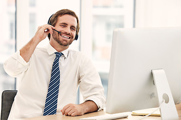 Image showing Call center man and telemarketing for customer support or consulting in office. Male, consultant and agent with headset, communication or computer for client service, talking or speaking in workplace