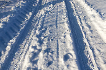 Image showing narrow winter road , closeup