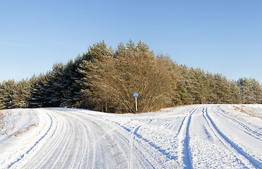 Image showing winter time on a narrow rural highway