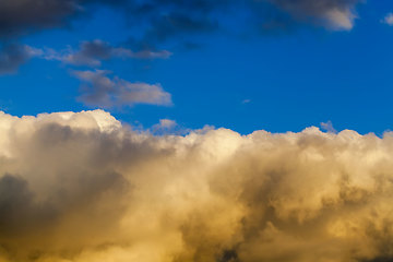 Image showing yellow bright the clouds during sunset