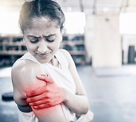 Image showing Woman, fitness and shoulder pain in gym for exercise workout, training accident and sports medical emergency. Sad athlete, arm injury and physical therapy, arthritis or muscle wellness in health club