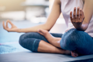 Image showing Yoga, zen and woman doing a meditation exercise in gym with lotus pose for calm, peace and balance. Mindfulness, energy and girl doing pilates workout for mind, body and spiritual health and wellness