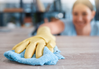 Image showing Hand, woman and table cleaning for hygiene, housework and household cleansing in an apartment. Hands, girl and clean product for dust, dirt and germs, bacteria and illness prevention on surface