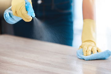 Image showing Cleaning, housekeeping and hands with spray bottle on furniture for spring cleaning, dust and dirt on surface. Housework, healthcare and person with rubber gloves, cleaning products and disinfection