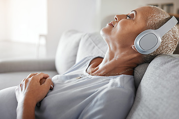 Image showing Relax, music and pregnant with black woman on sofa for peace, health or online streaming service. Podcast, audio and mobile radio with lady listening to headphones for pregnancy, freedom and wellness