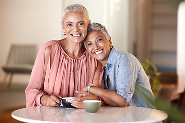 Image showing Senior women, hug and friends at cafe, having fun and bonding. Portrait, love and retired, happy and elderly females in coffee shop, smiling and embrace, cuddle or hugging and enjoying time together