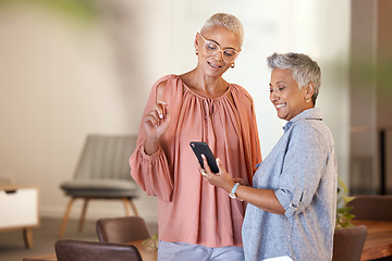 Image showing Senior women, phone and friends in home on social media, internet browsing or texting. Tech, cellphone and retired, elderly and happy females web scrolling with mobile smartphone together in house.