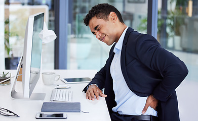 Image showing Back pain, business man and stress of a office consultant with burnout and anxiety at desk. Computer, businessman and working strain from a risk management worker looking for back support online