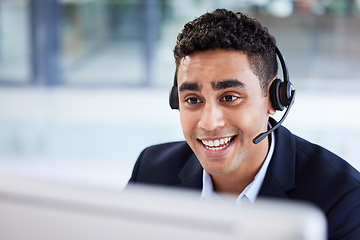 Image showing Businessman, computer or call center in telemarketing help company, customer support office or b2b sales CRM. Smile, happy or talking receptionist worker with technology headset in Indian contact us
