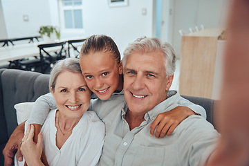 Image showing Family, love and selfie on sofa in home, having fun and bonding. Hug, portrait and grandpa, grandmother and girl taking pictures for profile picture, social media and happy memory together in house