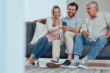 Image showing Family, phone and relax on sofa in living room, bonding and having fun. Cellphone, tech and happy man, woman and grandpa on mobile smartphone on couch streaming video, social media or web browsing.