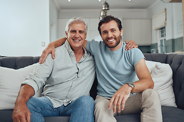 Image showing Portrait of a senior man with his adult son relaxing on a sofa together in the living room. Happy, smile and elderly male pensioner in retirement sitting and bonding with a young guy in family home.