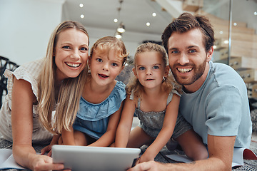 Image showing Kids, portrait and family with tablet on home floor for bonding, relaxation and streaming. Happy, mother and dad with children in house enjoying online movie together on weekend in Canada.