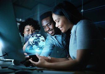 Image showing Teamwork, world hologram and business people with phone in night office working late on project deadline. Futuristic tech, global iot and group of happy men and women on smartphone in dark workplace.