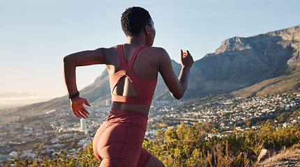 Image showing Back, black woman and running in nature, workout and training for wellness, health and fitness. African American female, trainer and runner outdoor, practice for marathon and exercise for cardio.