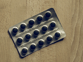 Image showing Vintage looking Medical pills on a table