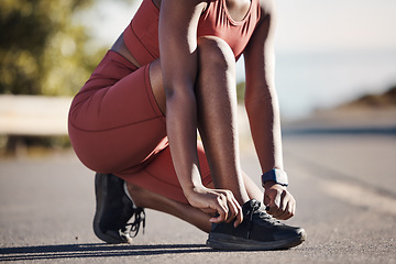 Image showing Lace shoes, fitness woman and street workout for cardio training, running and wellness. Runner, athlete and girl tie sneakers to start marathon exercise, sports and performance for healthy body goals