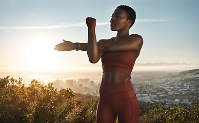 Image showing Fitness, hiking and black woman on mountain stretching, meditation and training in nature for healthy lifestyle. Health, wellness and workout for woman on cliff, yoga on hill for hike in mountains.