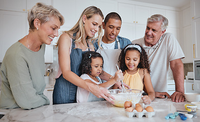 Image showing Family in kitchen, baking and grandparents with kids, parents and bonding for quality time, love and smile together. Mother, father and daughters with grandmother, grandfather and cooking on weekend.