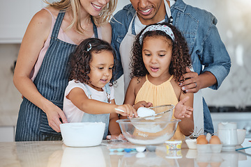 Image showing Love, parents and girls in kitchen, baking and happiness for weekend break, child development and relax. Mother, father and daughters cooking, family bonding and fun with food, ingredients and home.