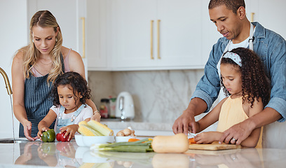 Image showing Cooking, family and kitchen learning of a girl with mother and dad with love and parent support. Interracial, teaching and vegetables in a house with children and parents making health and diet food