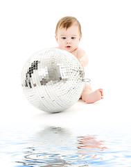 Image showing adorable baby boy with big disco ball