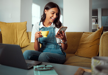 Image showing Relax, coffee or tea girl with phone for social media, ecommerce or news with wifi in home. Internet, communication and gen z student on sofa with smartphone app, smile and drink for leisure.