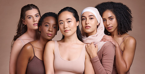 Image showing Portrait, beauty and diversity with a model woman group in studio on a brown background for inclusion. Face, natural and different with a female and friends posing to promote health or equality