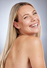 Image showing Beauty, skin and skincare with woman and smile, natural cosmetics with face, fresh facial and treatment against studio background. Happy model, hair care and keratin with glow and wellness portrait.