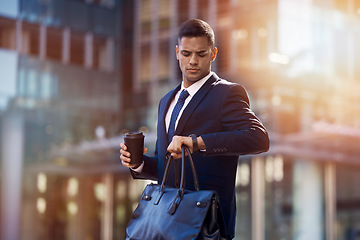 Image showing Businessman, city walk and check time for meeting, appointment or transportation with bag, coffee and focus. Young corporate executive, watch clock and metro for transport, train or taxi in New York