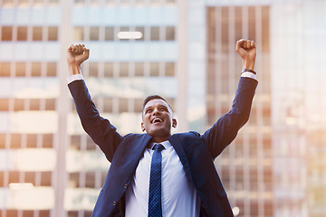 Image showing Businessman, success and winner with happy corporate employee, promotion or bonus with win and positive reaction. Motivation, achievement and victory at work with growth and development in career.