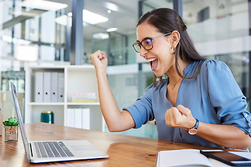 Image showing Success, celebration and business woman on laptop after winning online lottery, bonus or promotion. Winner, achievement and female employee happy, excited and celebrating stock market investment.