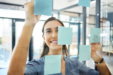 Image showing Agenda, writing or woman with sticky notes for goals, our vision or mission for a startup company in an office building. Smile, creative or happy employee planning ideas or a productivity schedule