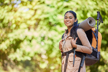 Image showing Hiking, portrait and fit woman backpacking in nature for fitness, strength and adventure. Backpacker, hiker and face of a female sportwoman exploring in a forest for fresh air and trekking peace