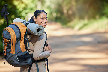 Image showing Hiking, woman and portrait of a hiker in a forest for adventure backpacking in nature. Female backpacker, hike and exercise or fitness to explore natural environment while training in the woods