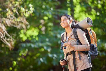 Image showing Woman, happy hiking and nature with backpack, trees or binocular in sunshine on forest journey. Hiker girl, smile and summer camping in woods, outdoor freedom or trekking on dream adventure in Amazon