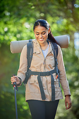 Image showing Hiking, travel and woman with trekking pole for stability or mobility outdoors. Freedom, adventure or happy female hiker from India exercise or training with walking stick for tough terrain in nature