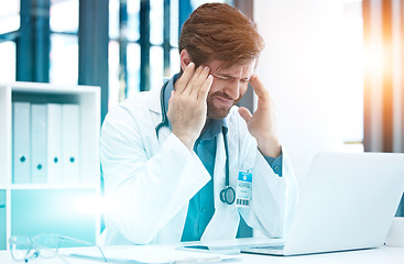 Image showing Doctor, headache and hospital computer of a healthcare man worker with stress about life insurance. Health consulting, anxiety and burnout of a employee with a 404 and laptop glitch data problem