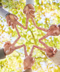 Image showing Star, finger and group of people linked from below for support, community and collaboration with friendship. Friends, shape and hand gesture for connection and solidarity with teamwork and commitment