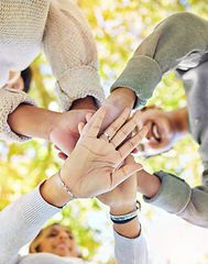 Image showing Hands stack, support with trust and team building outdoor, commitment and solidarity, group of people for development and growth. Team, collaboration and agreement, community and hand palm low angle.