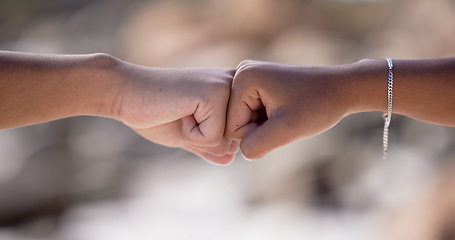 Image showing Fist bump, friends and support motivation outdoor for partnership travel holiday or trust vacation. Greeting, friendship agreement and celebrate collaboration success or hands together for solidarity