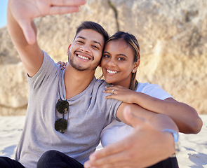 Image showing Couple, portrait smile and selfie on the beach for happy free bonding or relaxing time together in the outdoors. Man and woman smiling in relationship happiness for photo, capture or moments at sea