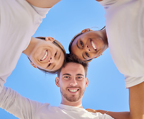 Image showing Diversity, friends and head circle together outdoor for happiness, support huddle and unity collaboration. Interracial friendship group, trust and smile for teamwork solidarity in California blue sky