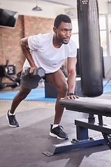 Image showing Gym, black man and dumbbell training, rowing exercise and healthy workout in fitness club. Strong bodybuilder guy row with weights, motivation and energy for sports, muscle power and body wellness