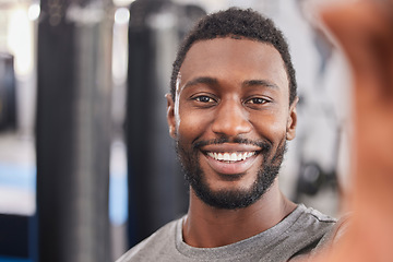 Image showing Gym, wellness and workout selfie of black man in Chicago, USA ready for healthy lifestyle exercise. Fitness, training and health club photograph of person excited for cardio session with smile.