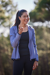 Image showing Fitness, park and portrait of woman pointing for motivation in exercise, running and marathon training in nature. Sports, relax and female athlete in forest for wellness, healthy lifestyle and cardio